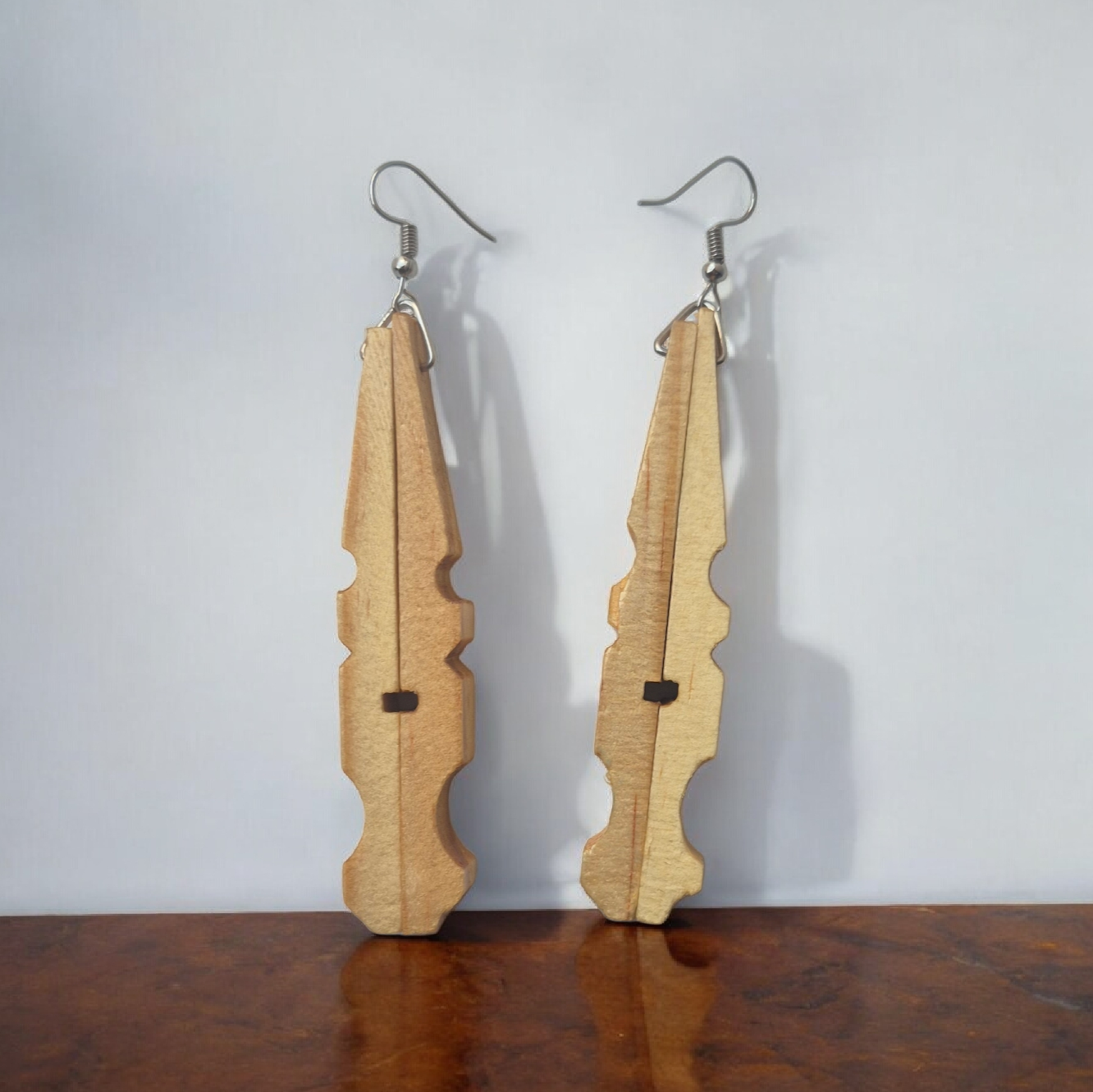 Pegs light-tan earrings